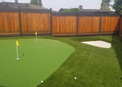 putting green with a bunker